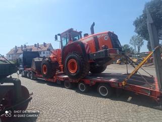 Transport maszyn, koparki, ładowarki, podnośniki, wózki widłowe 