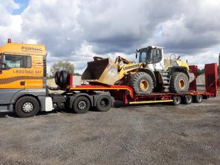 Transport wózków widłowych maszyn koparek Poznań 604 999 084