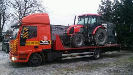 Transport wózków widłowych maszyn koparek Poznań 604 999 084