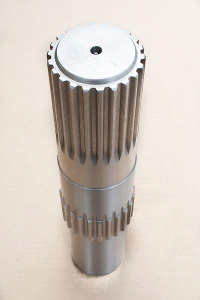 Wałek mechanizmu obrotu do koparko-ładowarki 